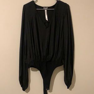 Free people body suit. Size small/ never worn